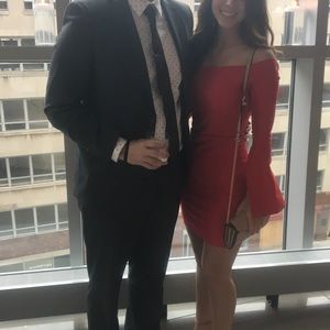 Red off the shoulder body con dress